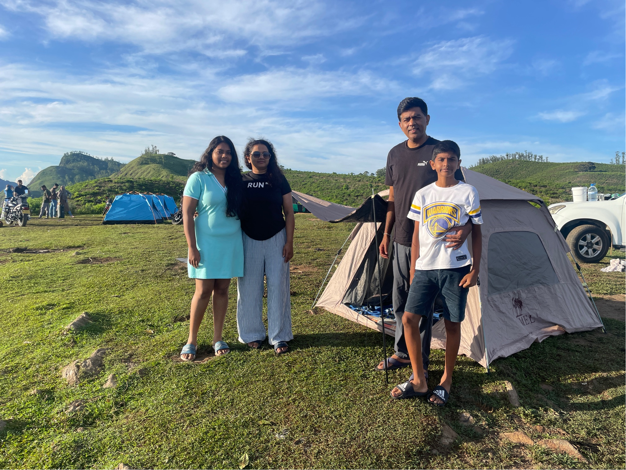 The Kalubowila family together in the Sri Lankan hill country